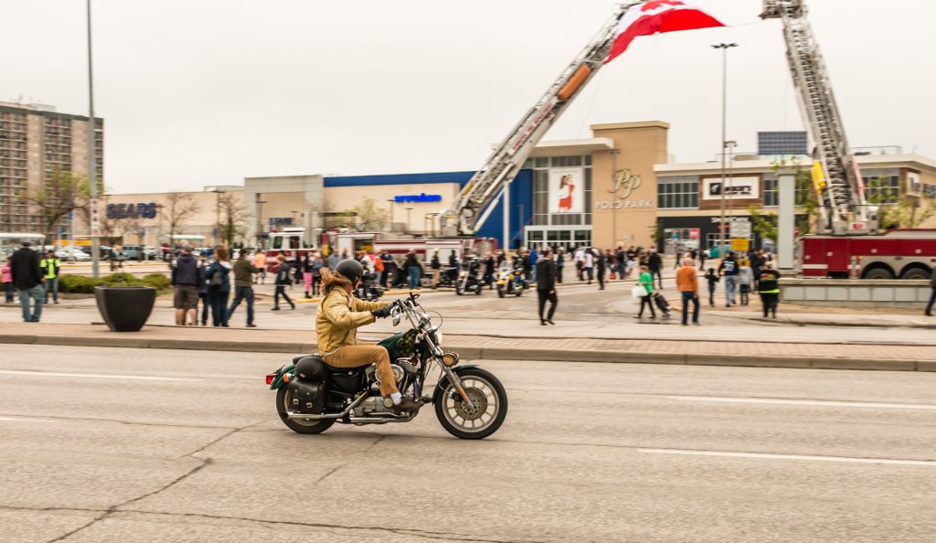 2016 Manitoba Ride For Dad 10 rider on motorcycle riding the wrong way by after the of the 2016 RFD